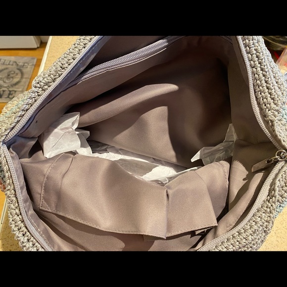 sale!Hand-crocheted and durable, Features a main compartment sipper - Picture 4 of 4